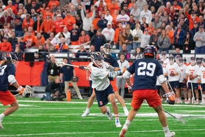 Sam English scored with less than a minute remaining to put No. 6 Syracuse in front for good as it defeated No. 4 Virginia 18-17.