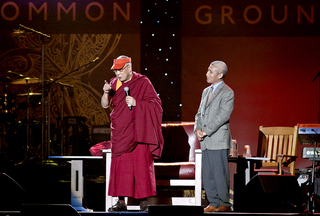 The Dalai Lama speaks to the crowd during the One World Concert.
