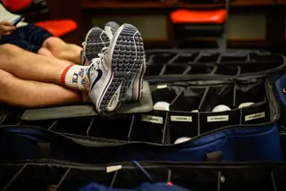 Syracuse managers have shoe cases for all of the players. They received matching shoes upon qualifying for the NCAA Tournament.