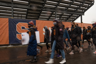 The women's cross country team marches to Coyne Stadium as part of the Black Athletes Lives Matter march organized by the Diversity and Inclusion Student-Athlete Board and the Student-Athlete Advisory Committee.